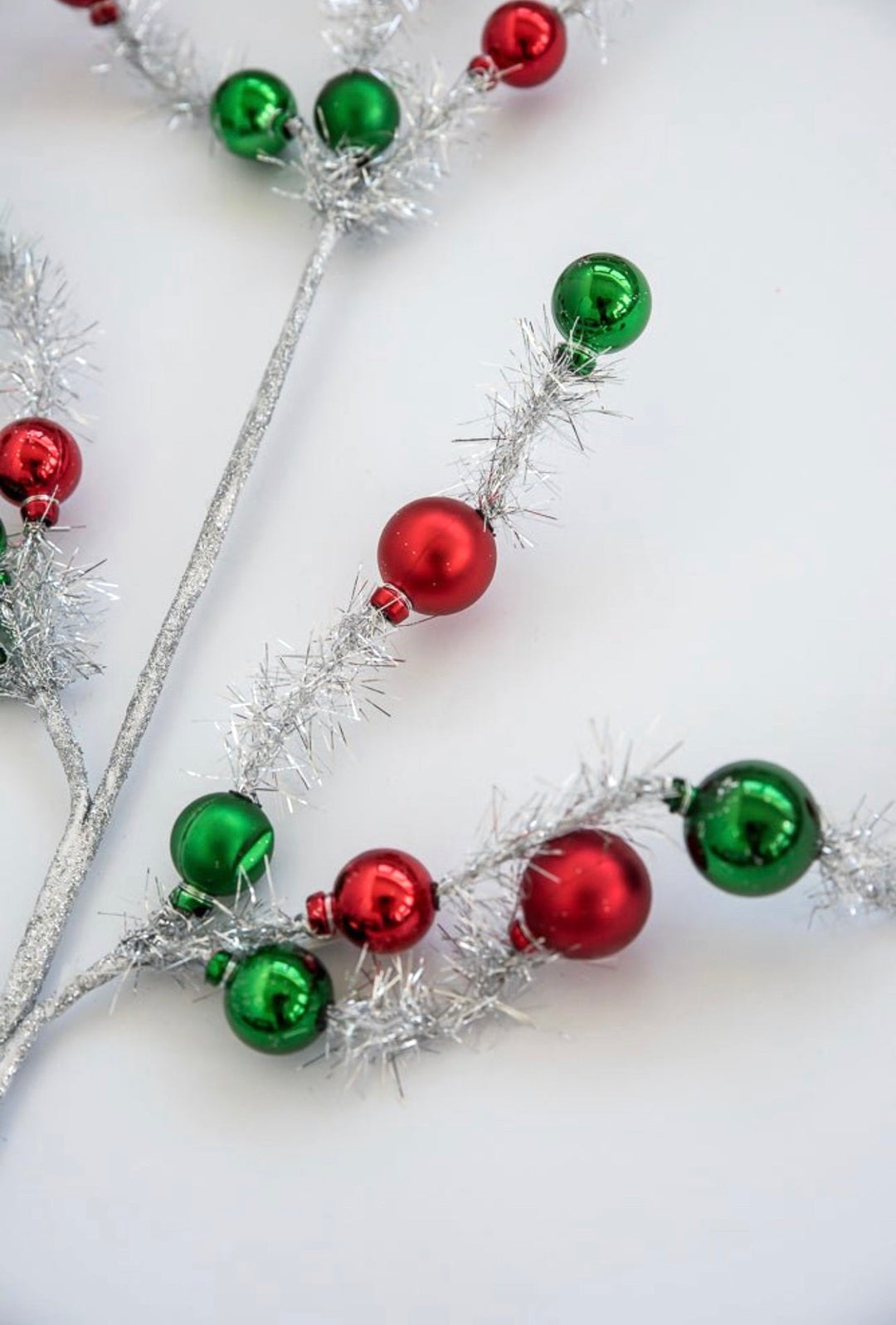 Red and green balls on silver tinsel wired stems - Greenery Market63690