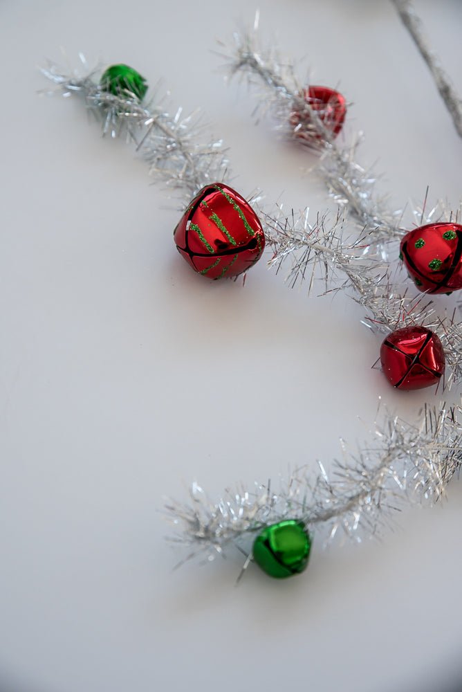 Red and green bells on silver tinsel wired stems - Greenery Market63691