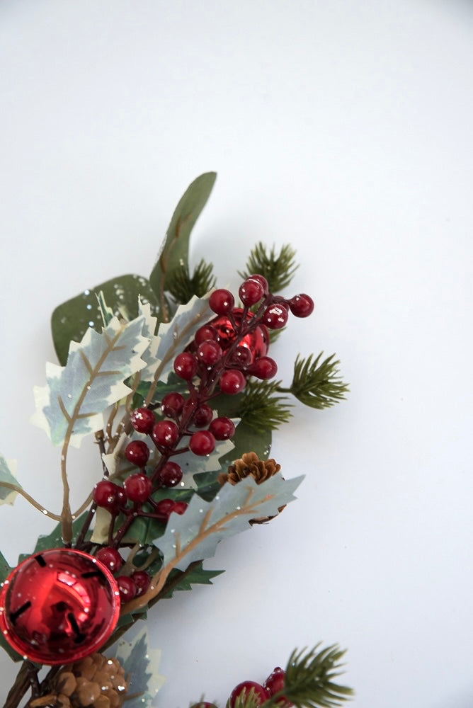 Holly, berries, and red bell spray