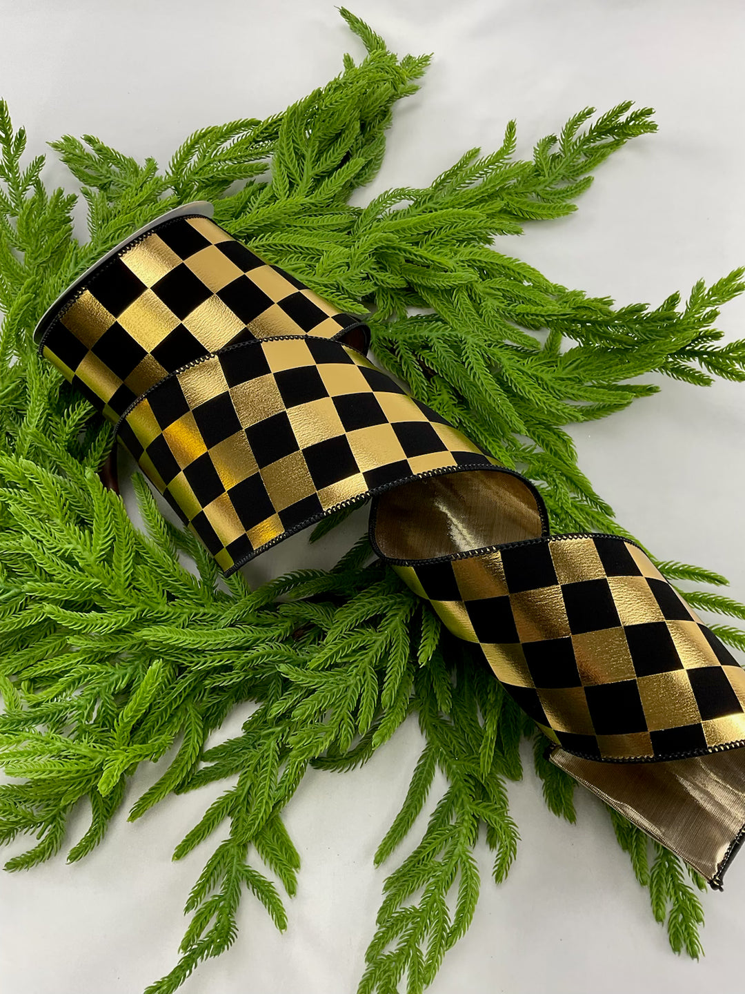 Gold and black check wired ribbon 4”