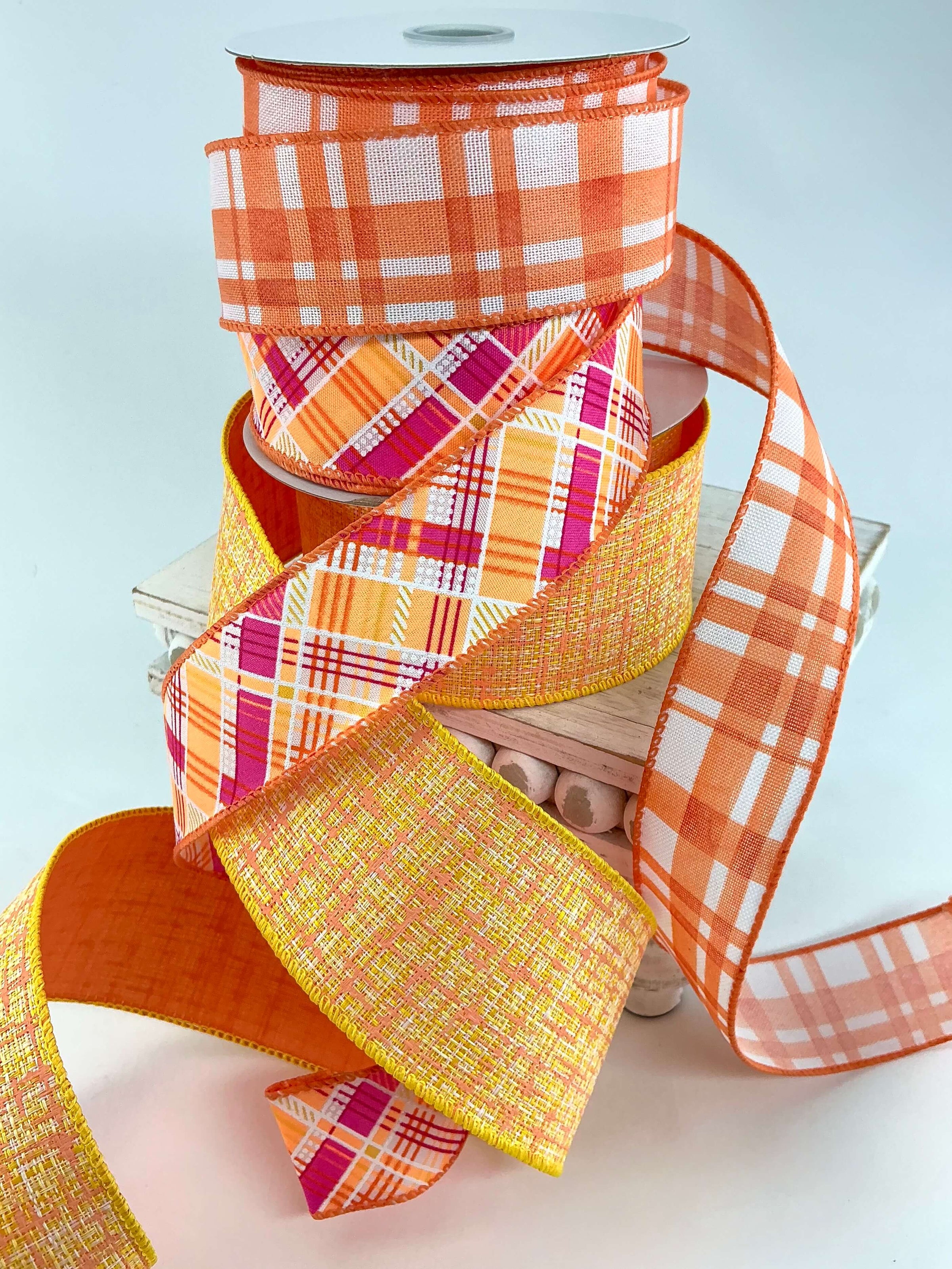 plaid and tweed ribbons in orange, white, and pink