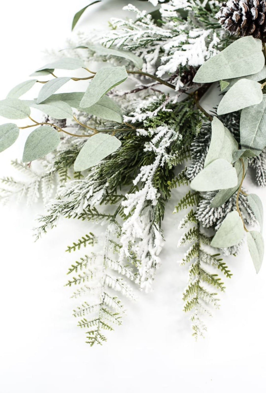 Flocked mixed greenery with cones spray - Greenery Market204445