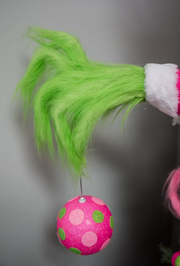 Green fluffy monster hand holding pink ornament - Greenery MarketPicksGM2116PKGN